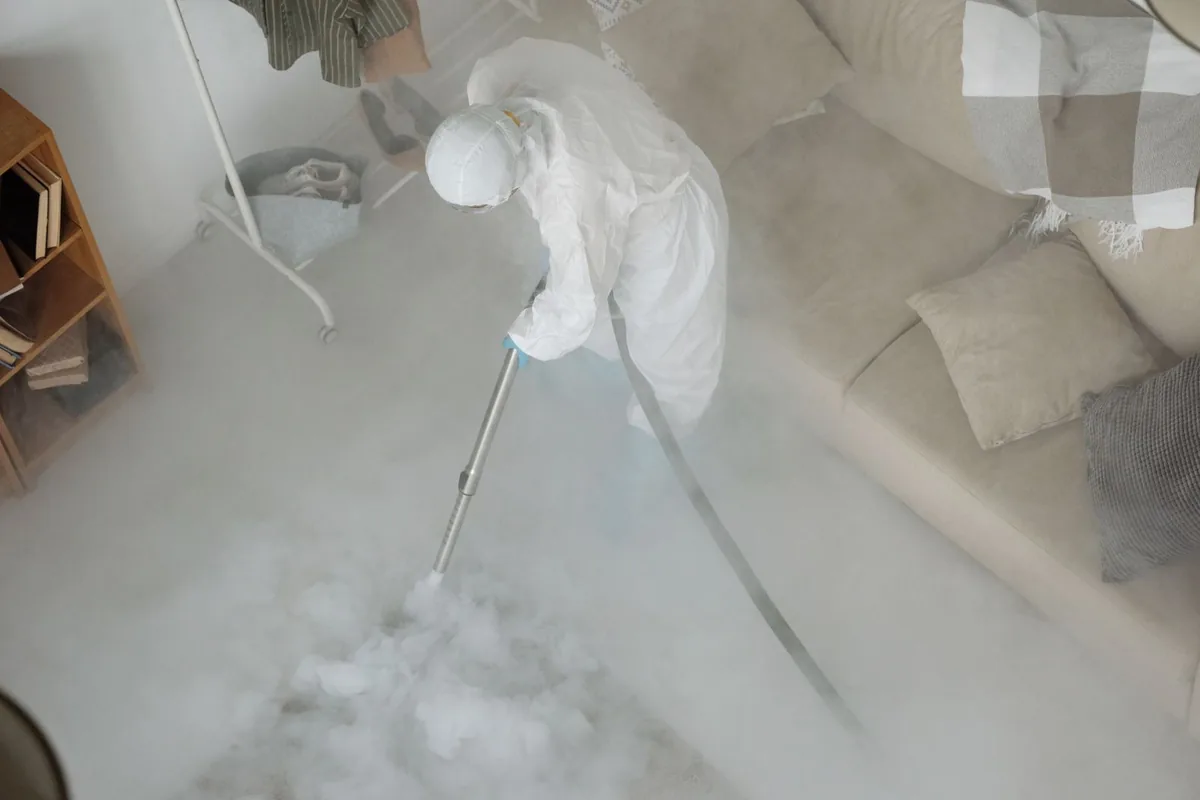 Biohazard cleanup technician in protective equipment, Union Mill, VA